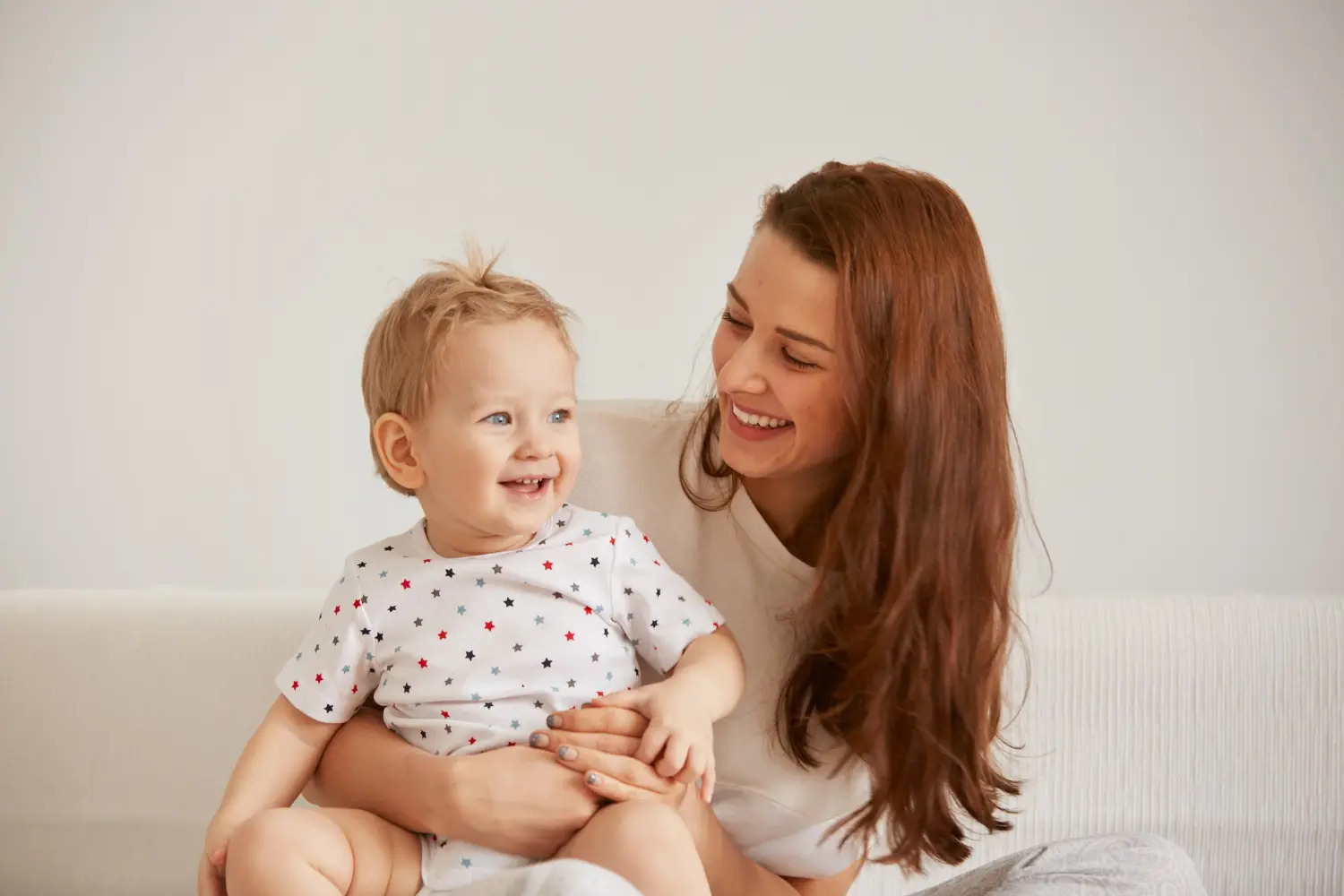 An ideal image for illustrating Baby Dentist Parent Education & Home-Care Tips at Pediatric Dentistry and Orthodontics of Forsyth - Cumming in Cumming, GA. Features a woman and baby.