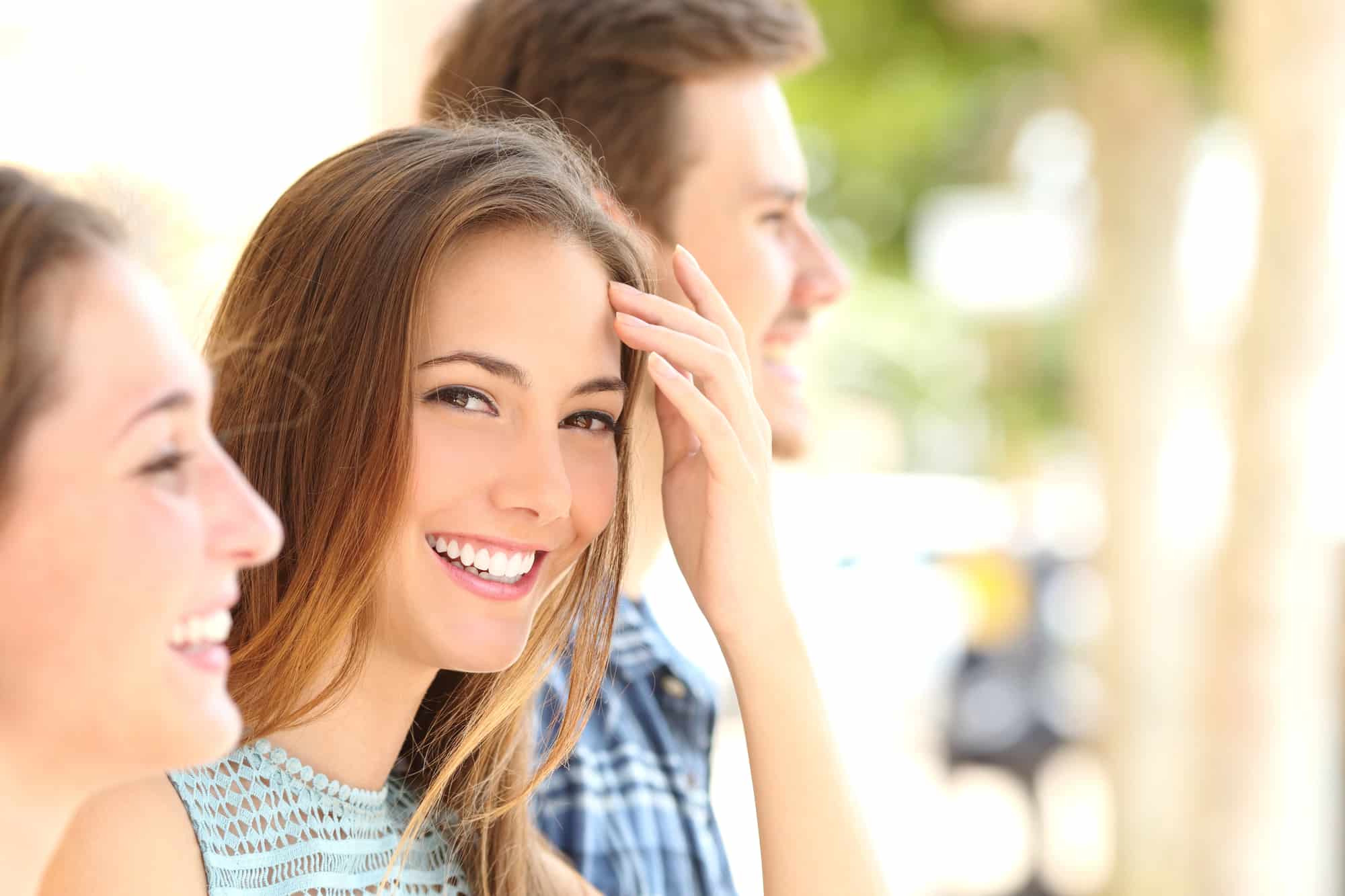 Three young people enjoy autumn air smiles, represent Herbst and MARA Appliance at Forsyth Pediatric Dentistry and Orthodontics in Cumming, GA.